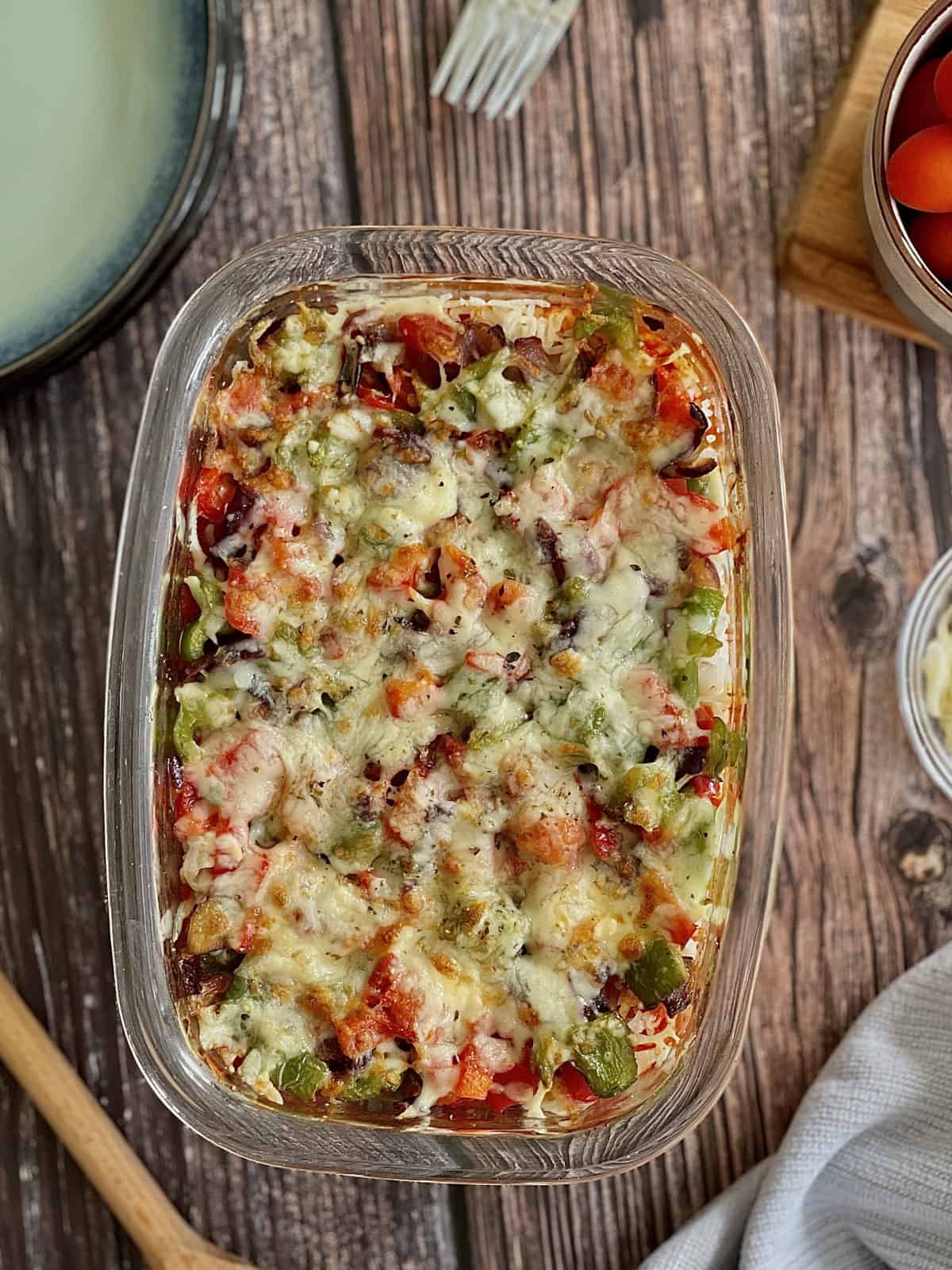 cheesy Italian mushroom and rice bake, served in a dish.