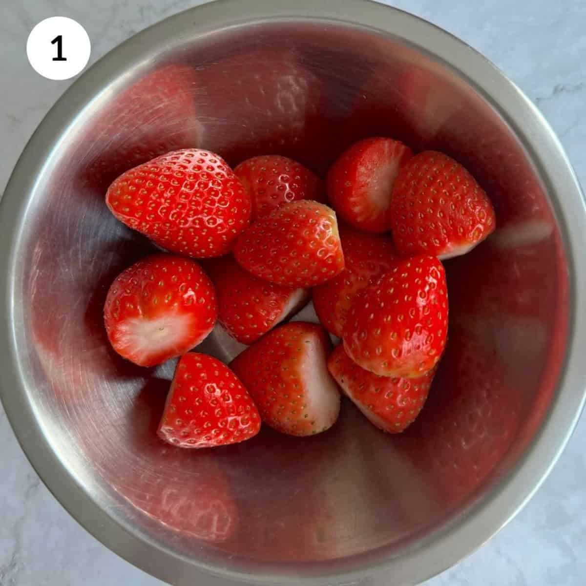 washing and hulling the strawberries.