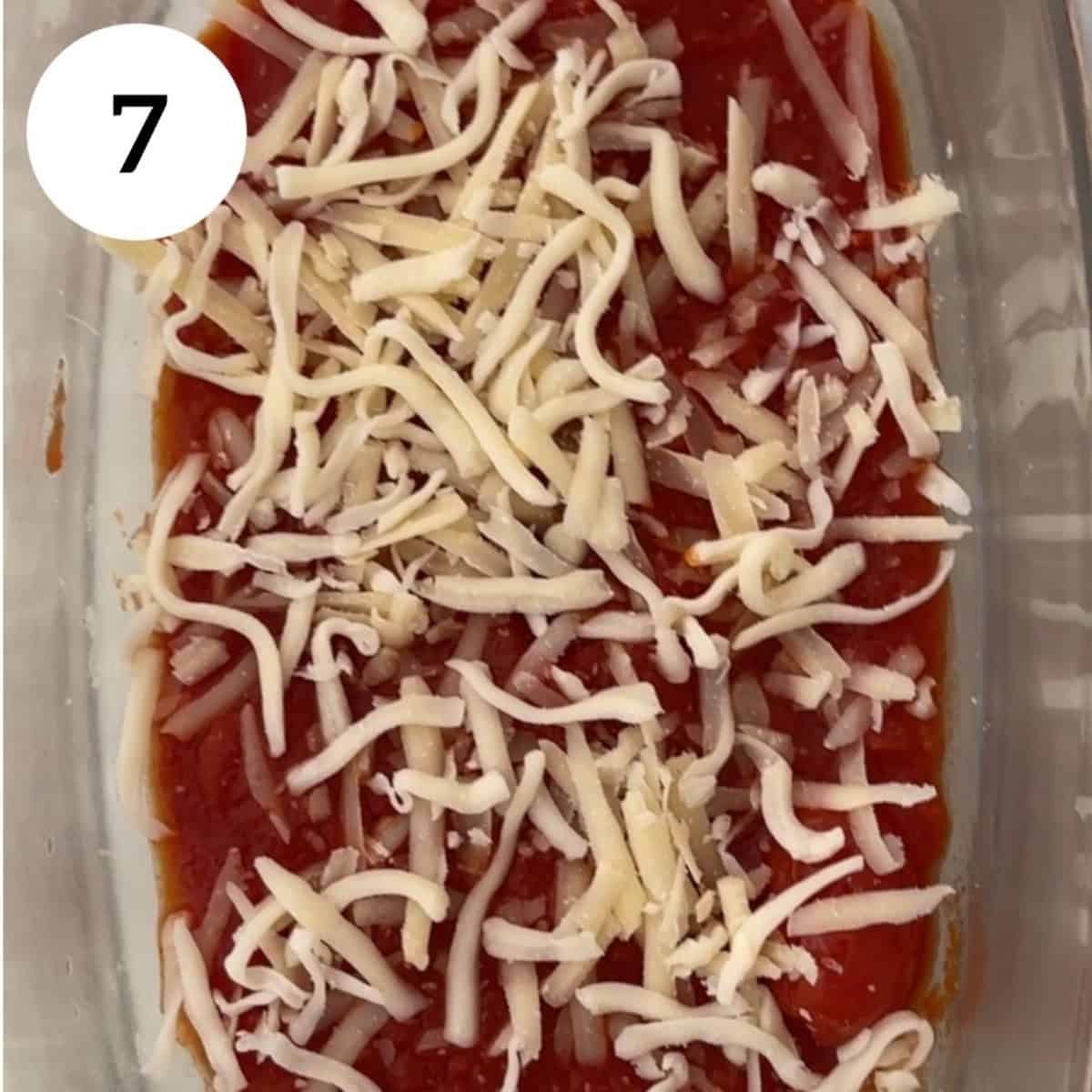adding a sprinkle of cheese on top.