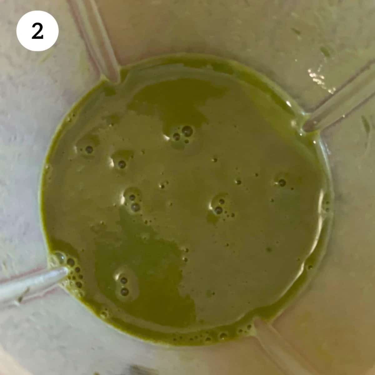 blending milk, dates and matcha powder in a small blender.