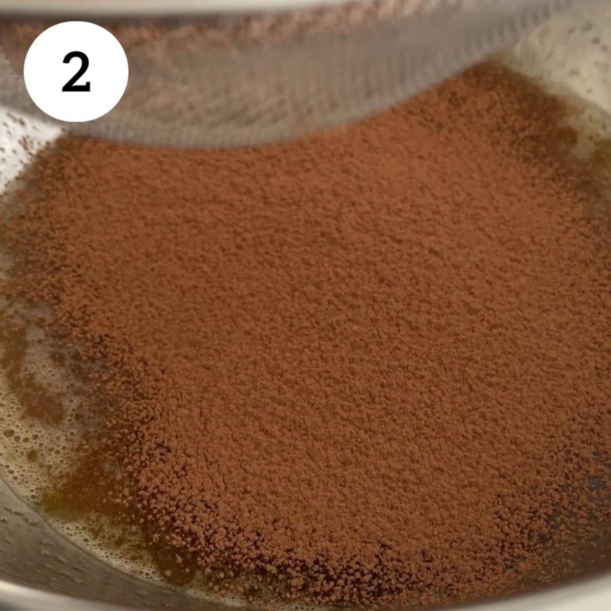 sifting the dry ingredients, including cacao powder.