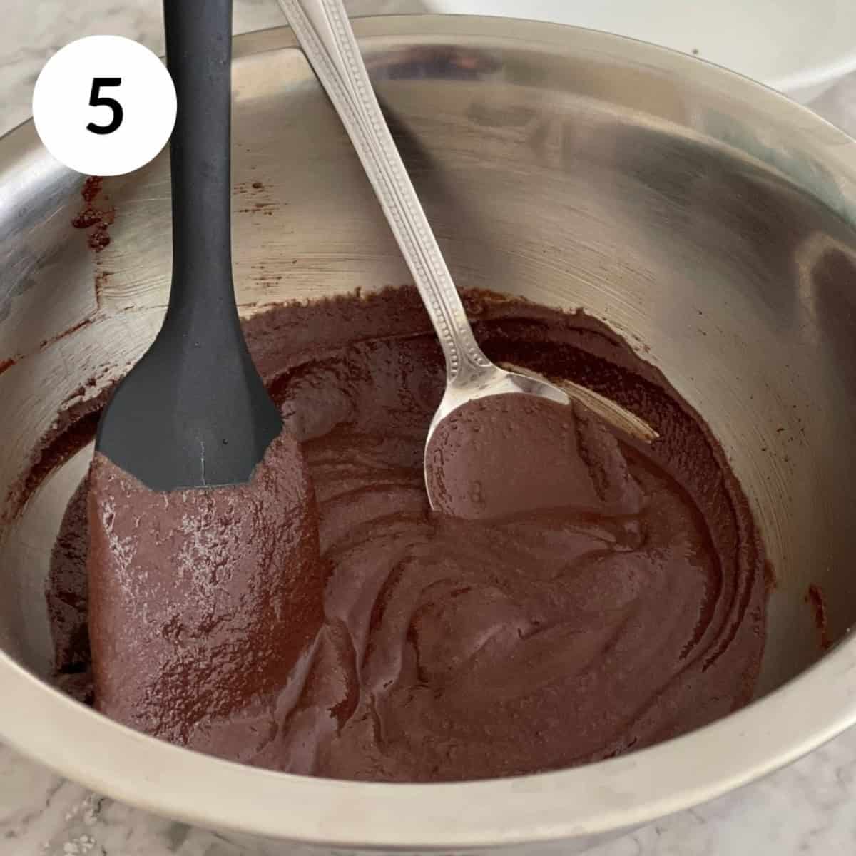 making chocolate ganache in a bowl.