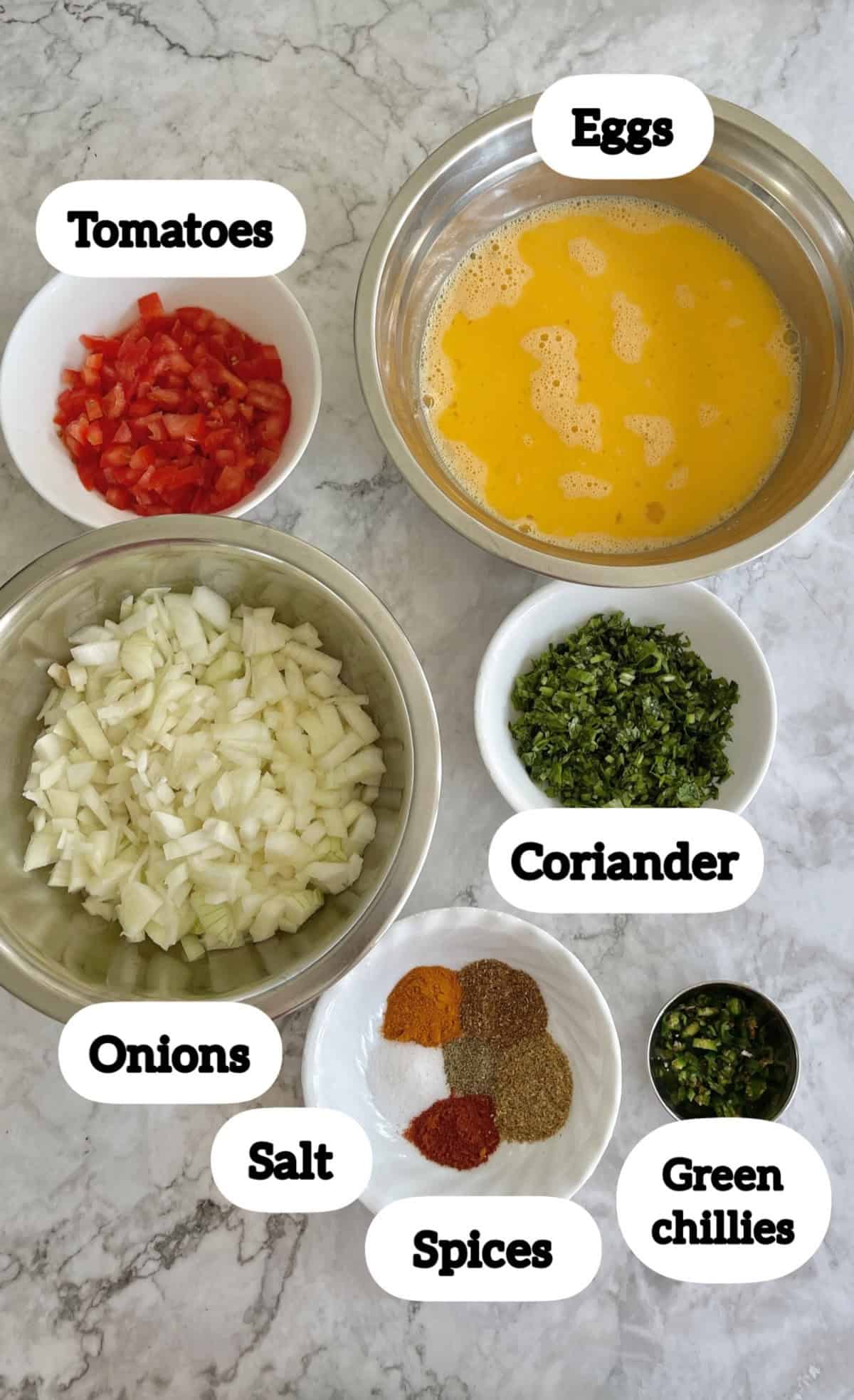 labelled ingredients to make masala scrambled eggs.