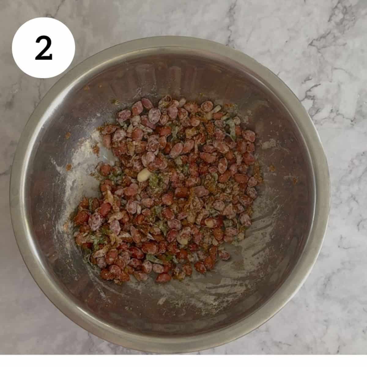 coating spiced peanut mixture with gram flour and olive oil.