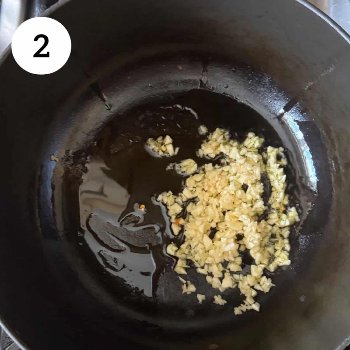 roasting garlic in a pan.